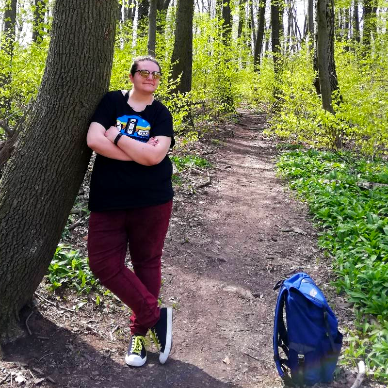 Me leaning at a tree in the Vienna Woods